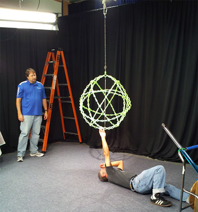 Plesser filming a physics demonstration for his astronomy course
