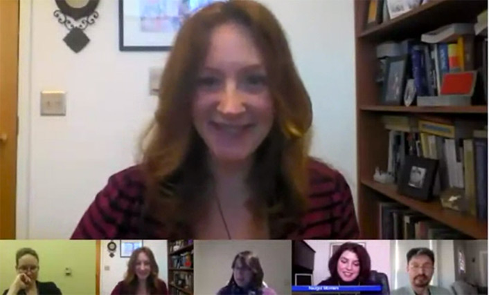 Comer leading a Google hangout with students in her English Composition course