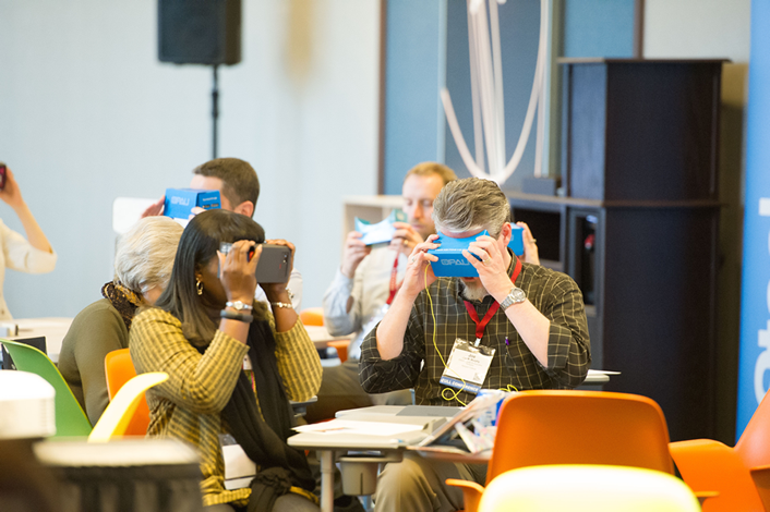photo of people using virtual reality headsets