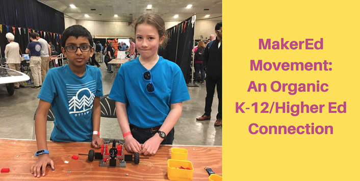 photo of two young students at a table making a robot