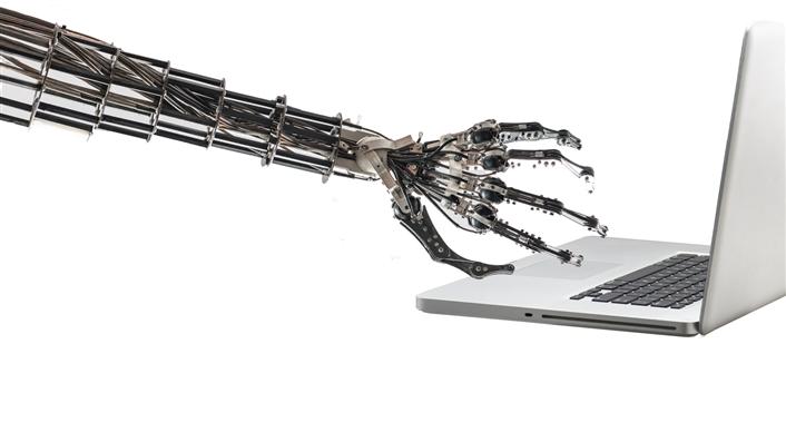 robotic hand and arm reaching for laptop keyboard