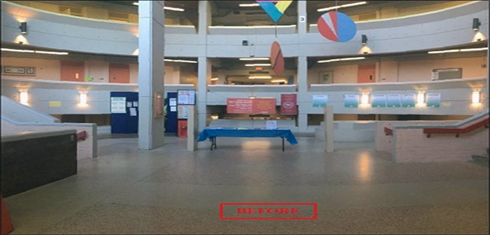 Image of the mostly empty rotunda with a folding table in the middle of it