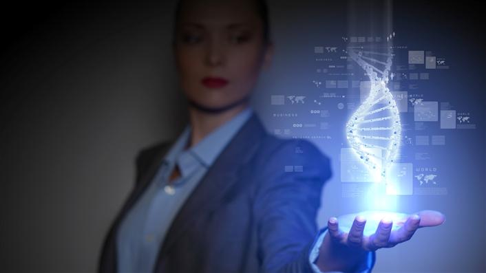 photo of woman holding holographic DNA double helix in her outstretched hand
