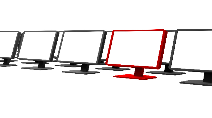 rows of black pc monitors with one red monitor in the front row. all monitor screens are blank.