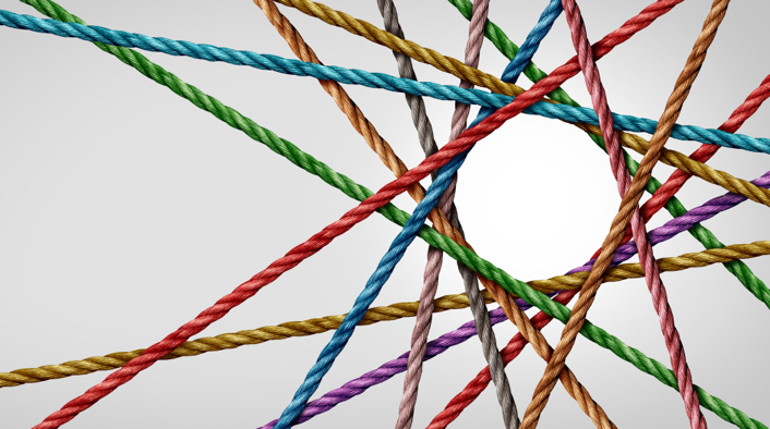 A matrix of colored rope with a circle in the center