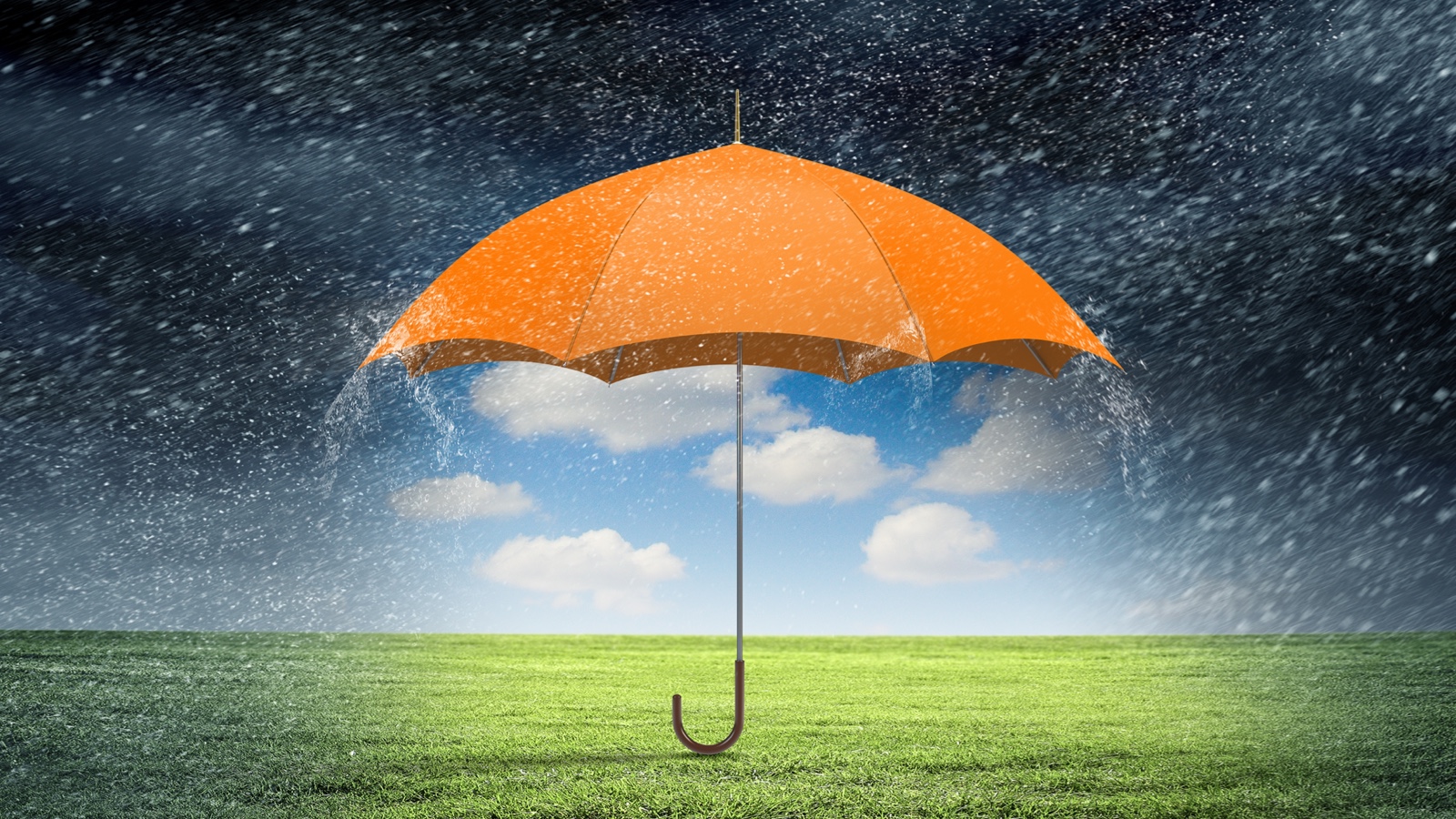 umbrella with rain above and around it, but blue sky with white clouds beneath it.