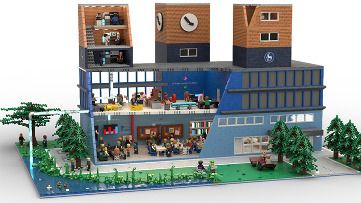Model of a campus building with walls cut out to see inside to the classrooms