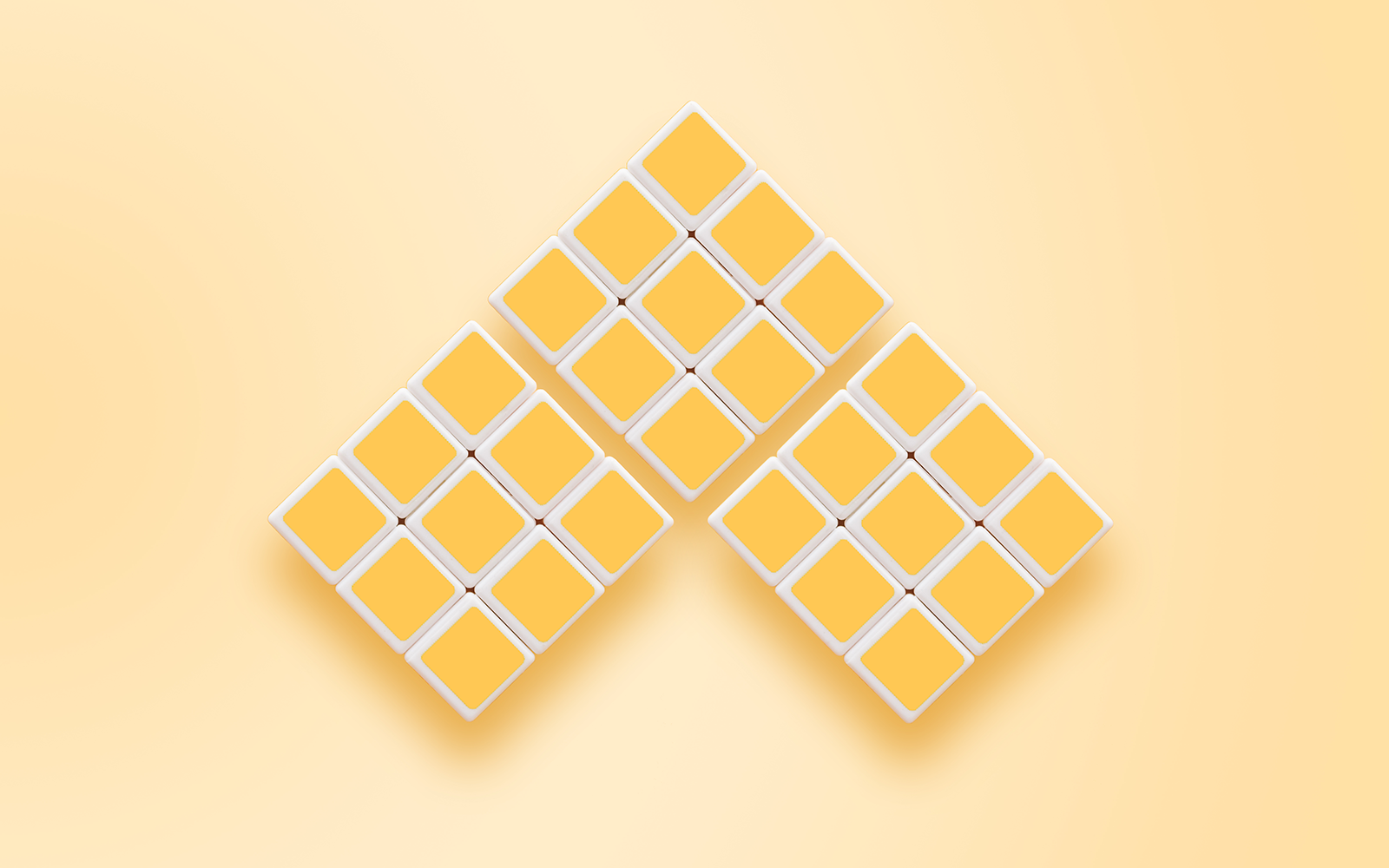 3 yellow rubics cubes