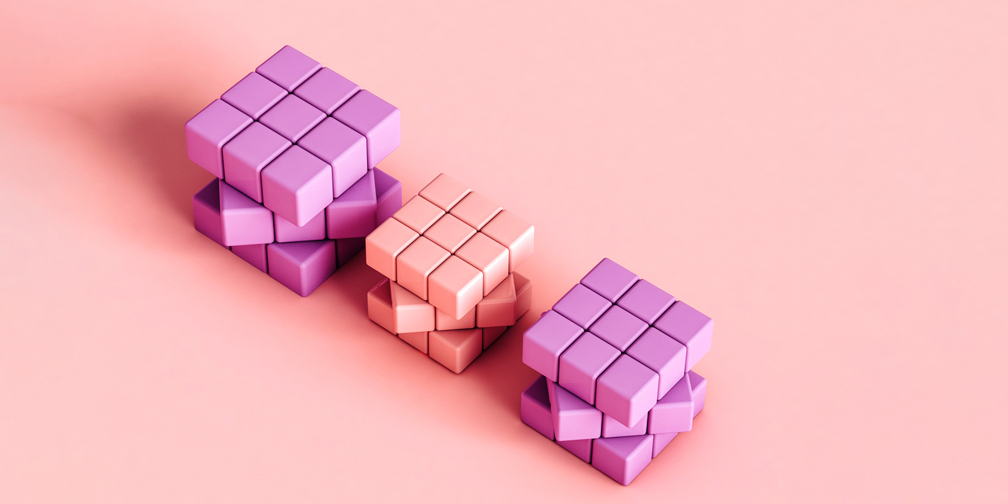 3 pink rubics cubes