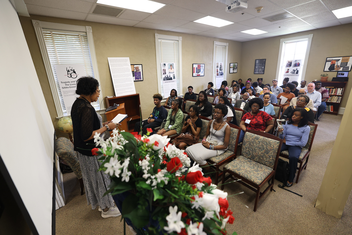 Photograph showing attendees listening to one of the presenters at the annual Gibbs–Green Commemoration