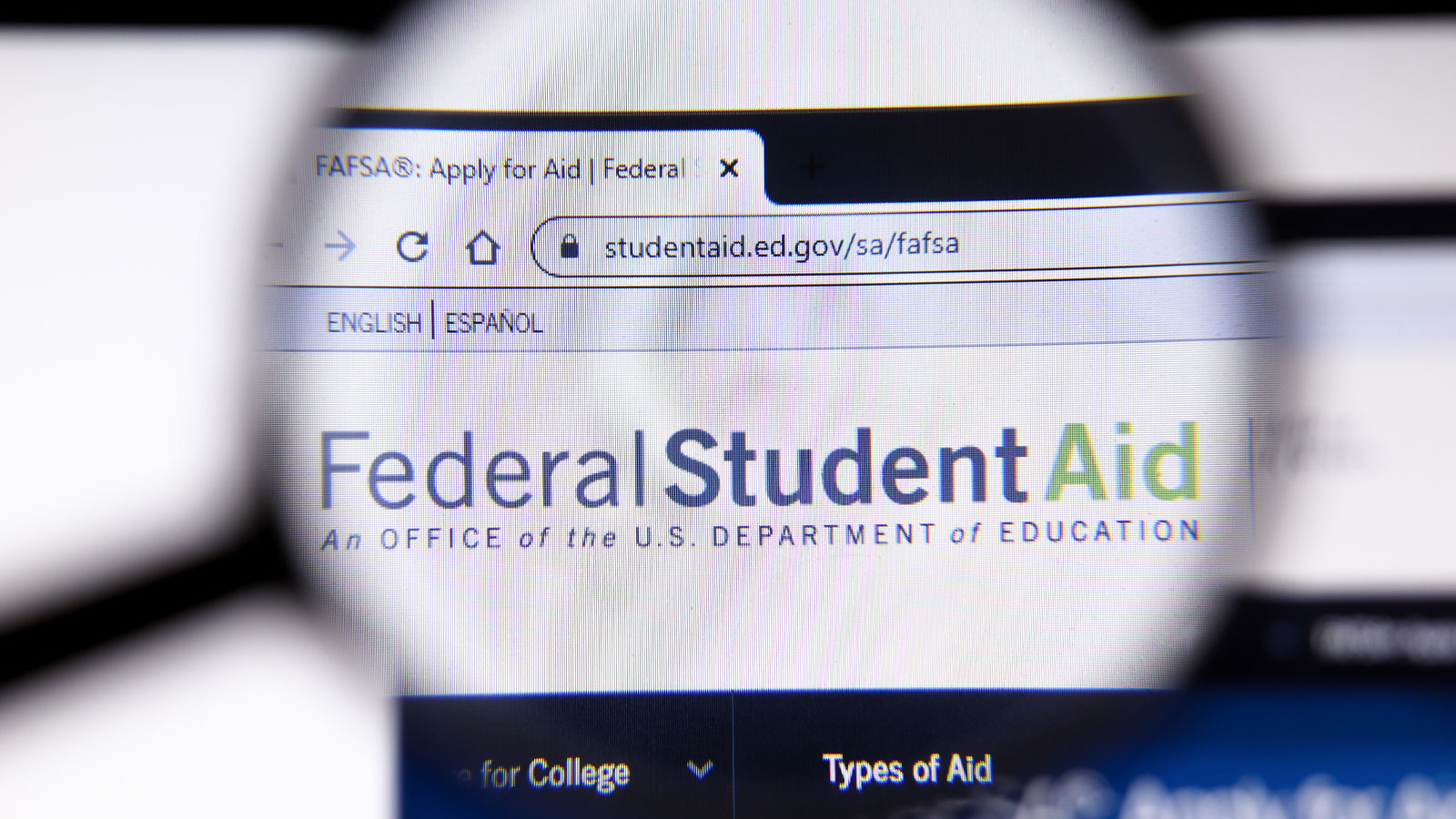 Federal Student Aid website through a magnifying glass