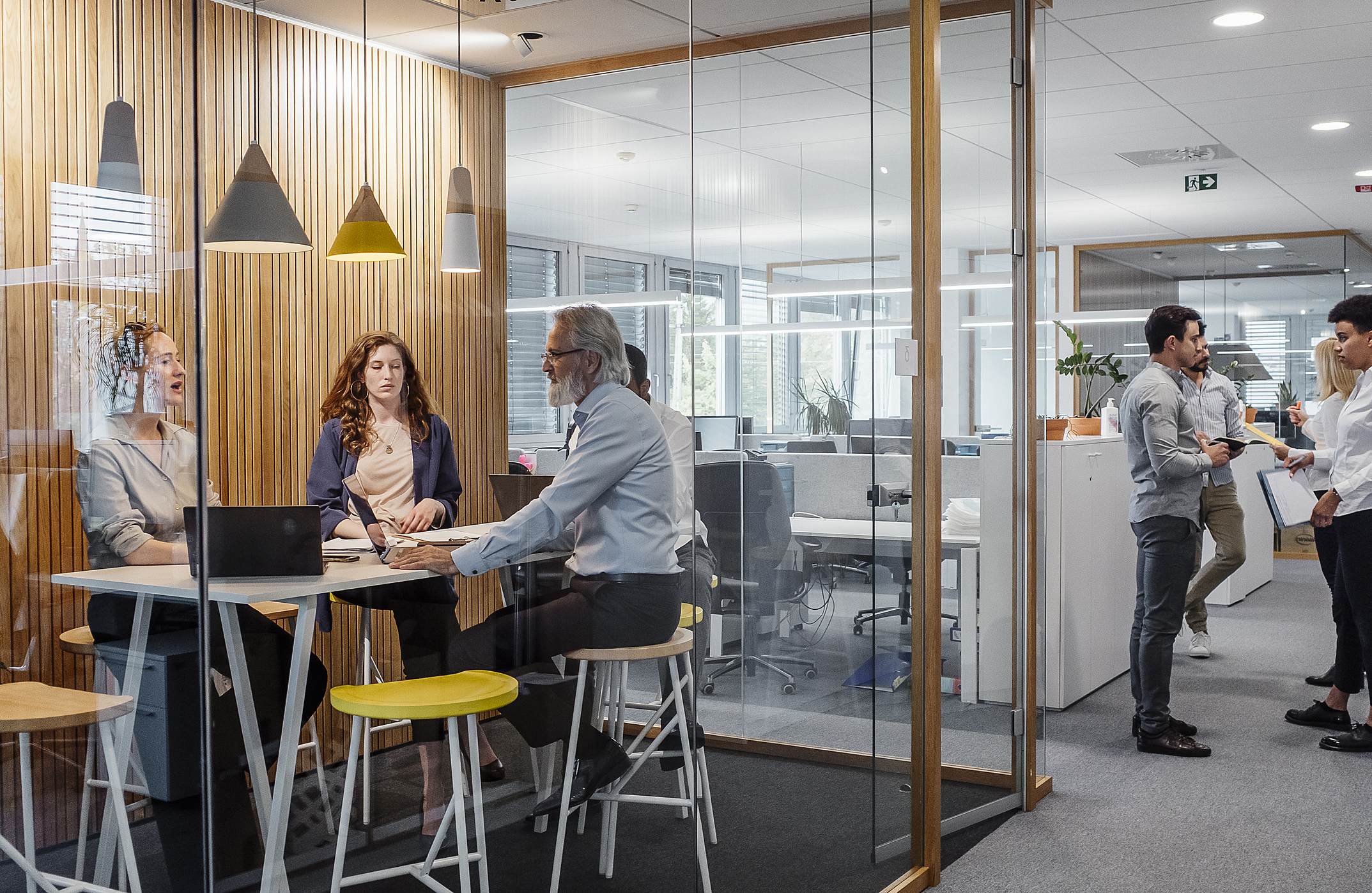 3 people working around a table