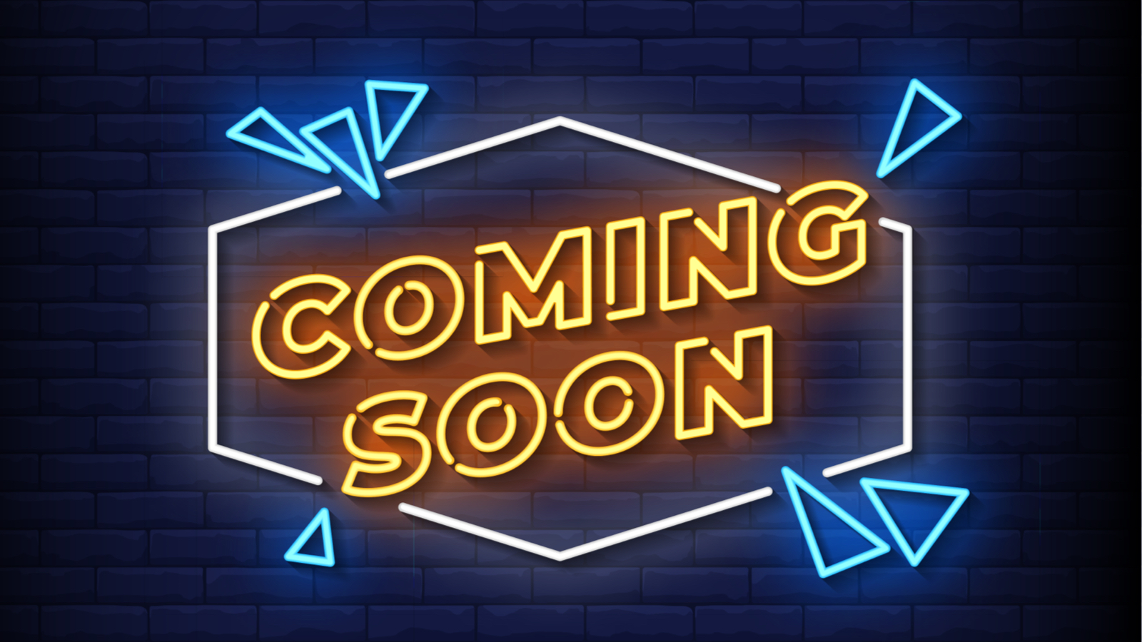 Neon sign that says 'Coming Soon'