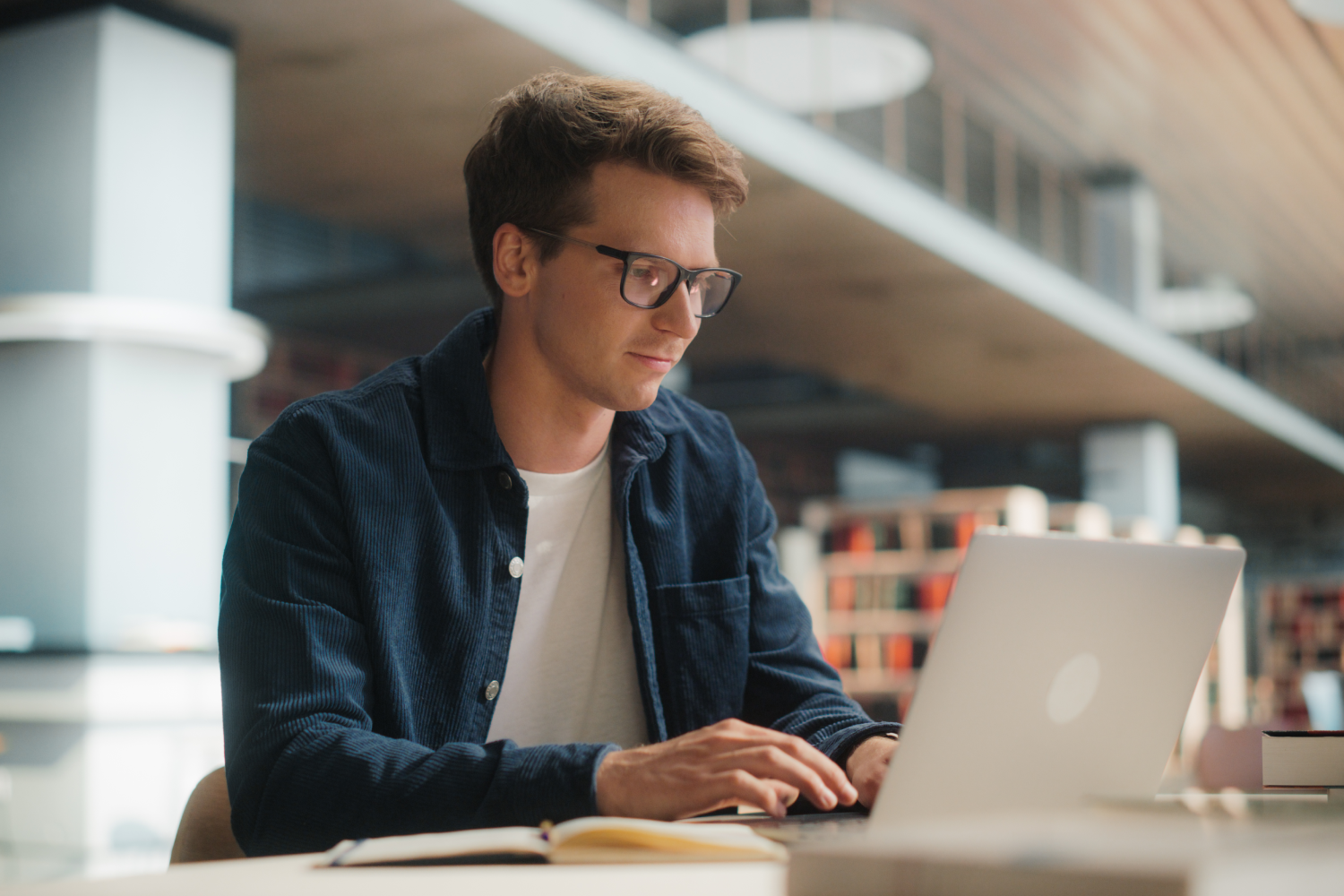 student working on a laptop