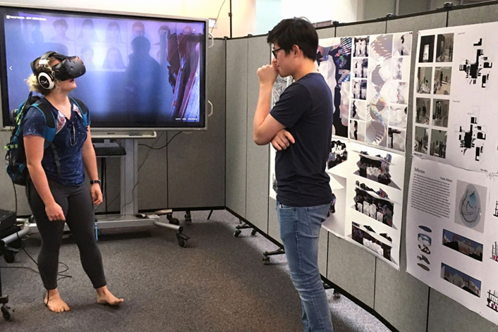 Figure 1. Students experience immersive virtual spaces at the College of Architecture at Texas A&M University