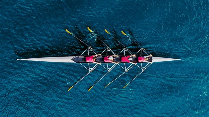 overhead photo of four-man rowing scull