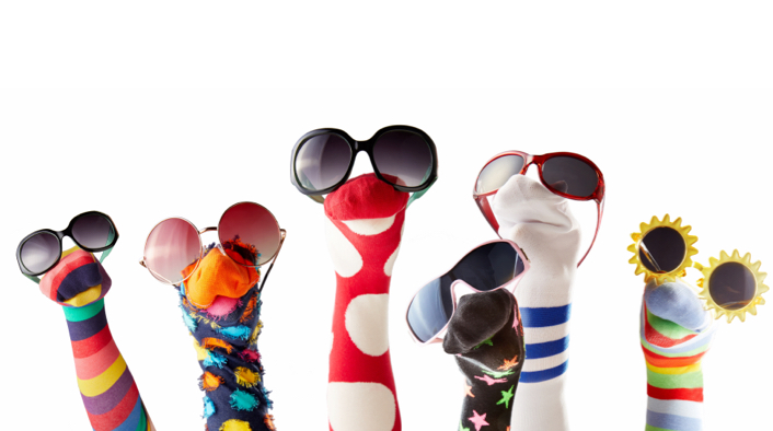 Colorful sock puppets wearing sunglasses