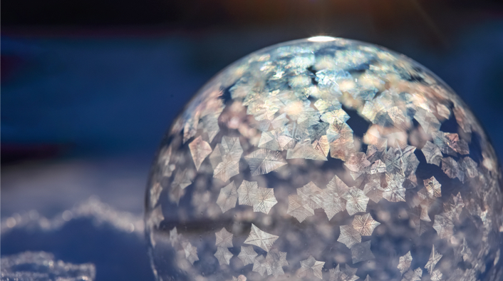 clear ball covered with hexagonal silver flakes