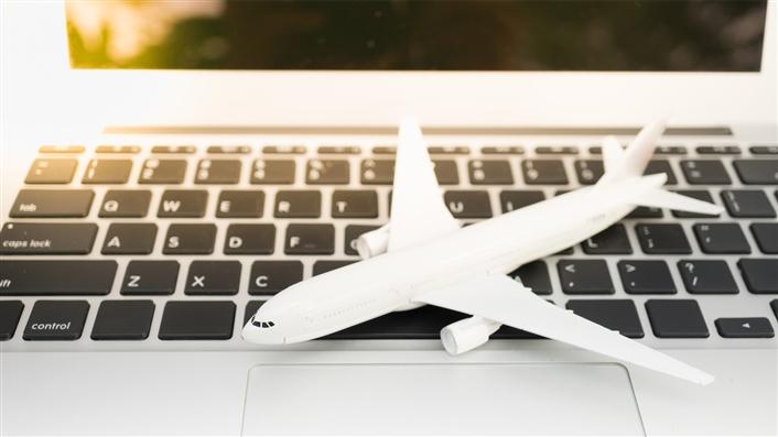 Blog Image - Aircraft sitting on a laptop keyboard