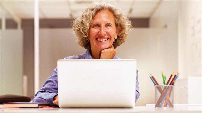 woman working at a laptop