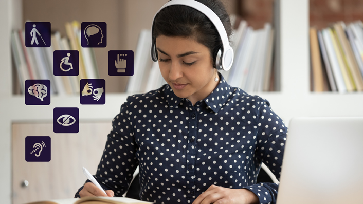 woman with headset working at a laptop