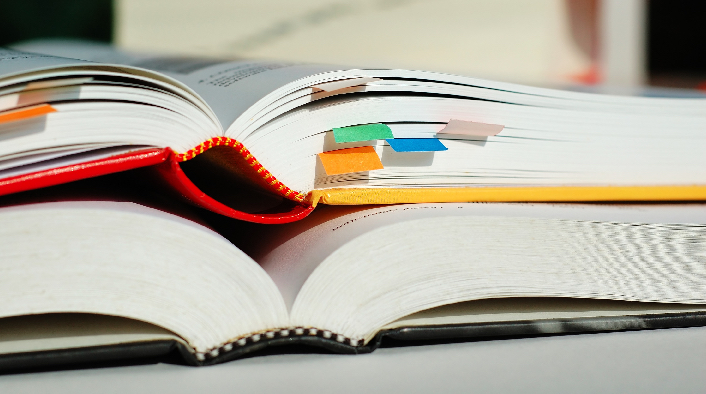 open books stacked on each other