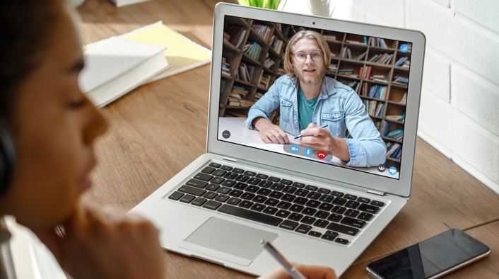 professor on laptop